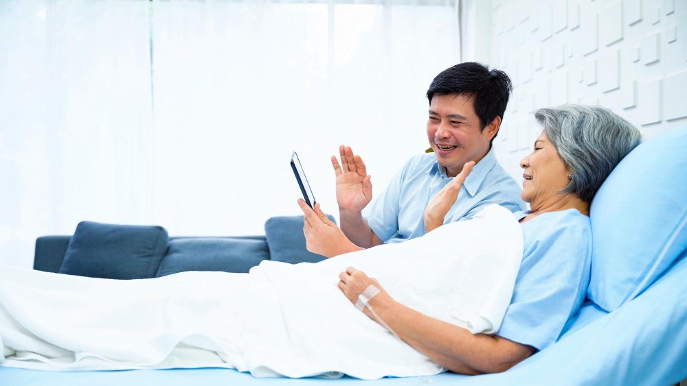 A patient is being visited by her relative