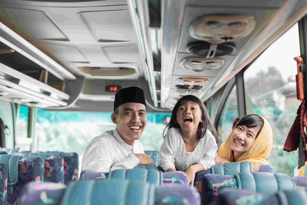 A family that enjoying riding a bus